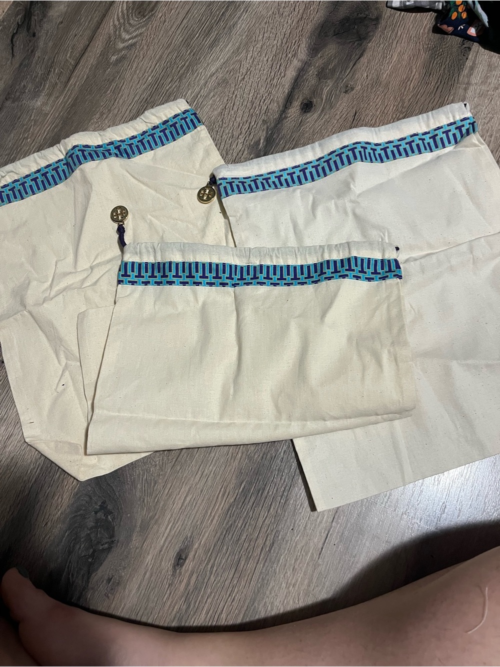 Set of 4 Tory Burch dust Canvas Pouches with trim